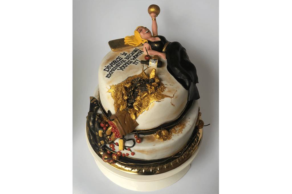 Two-tier cake with reclining woman figurine