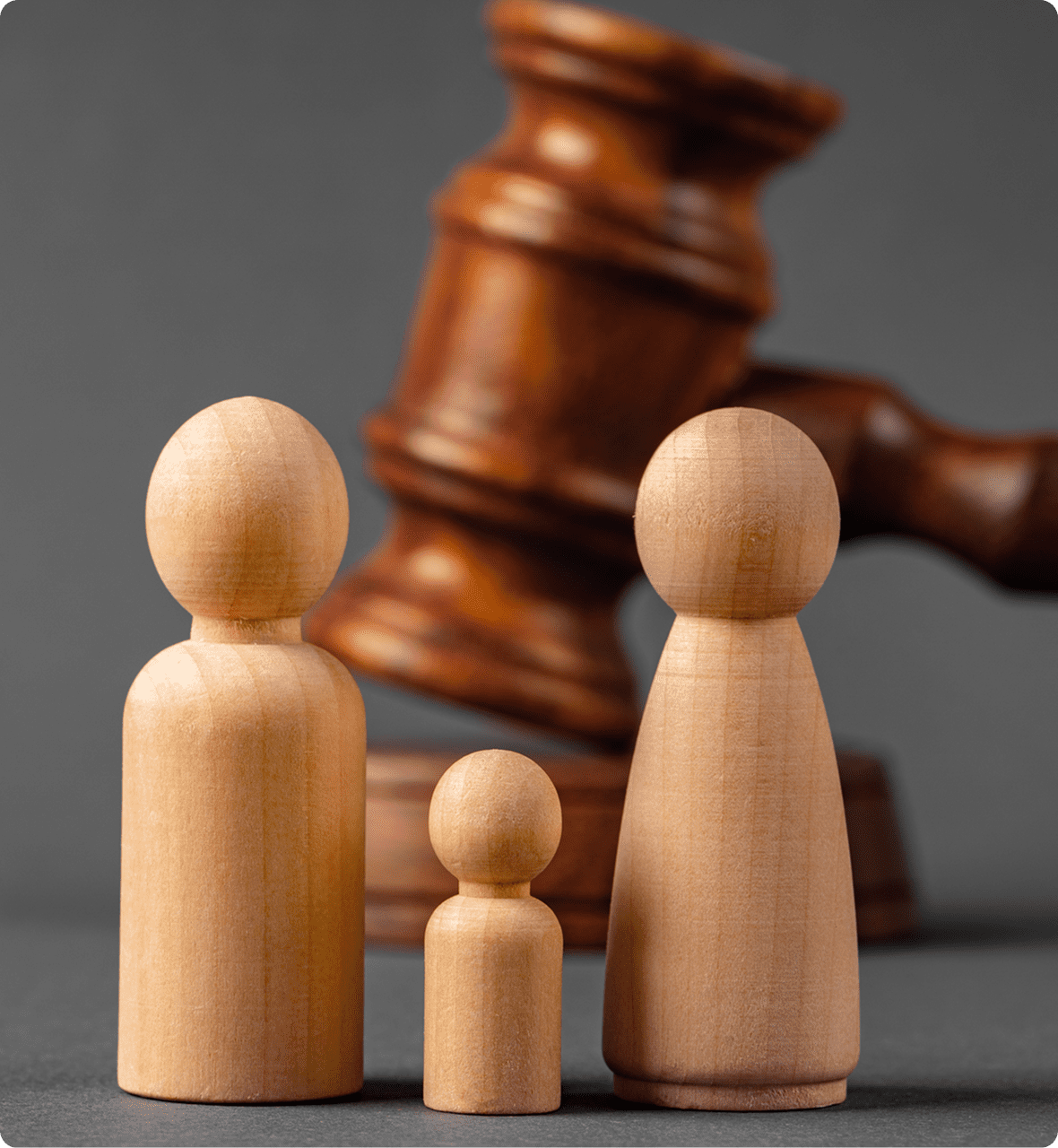 Family figurines and legal gavel